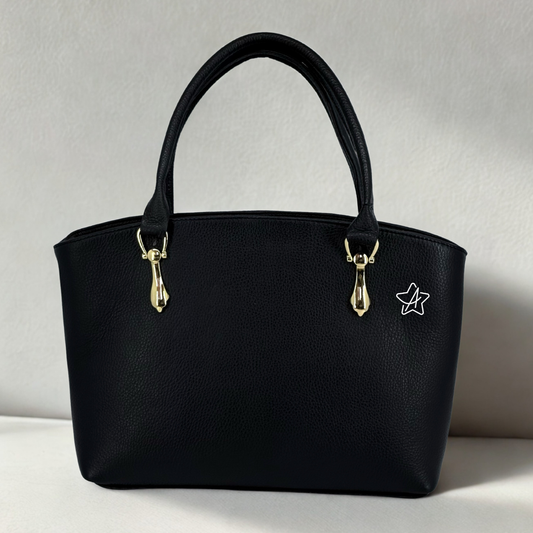 Bolsas de piel con  herrajes de Línea